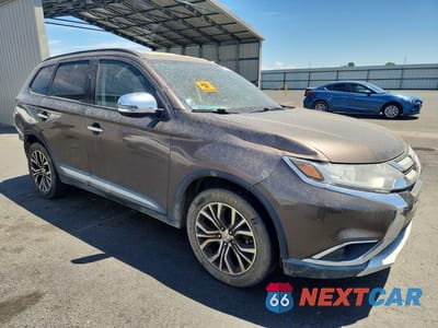 Czwarte zdjęcie samochodu z boku: 2016 MITSUBISHI OUTLANDER SE VIN:JA4AD3A34GZ007312 - miniatura