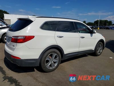 Trzecie zdjęcie samochodu z tyłu: 2016 HYUNDAI SANTA FE SE VIN:KM8SMDHF0GU145809 - miniatura