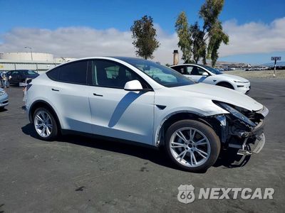 Czwarte zdjęcie samochodu z boku: 2021 TESLA MODEL Y VIN:5YJYGDEE3MF096918 - miniatura