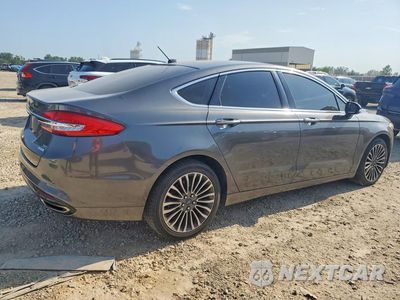 Trzecie zdjęcie samochodu z tyłu: 2017 FORD FUSION SE VIN:3FA6P0H96HR264348 - miniatura