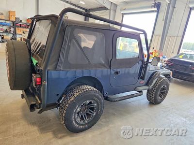 Trzecie zdjęcie samochodu z tyłu: 1997 JEEP WRANGLER / TJ SE VIN:1J4FY29P1VP545907 - miniatura