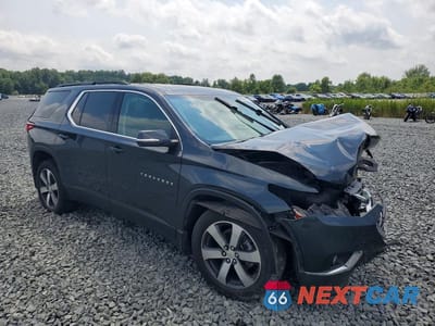 Czwarte zdjęcie samochodu z boku: 2021 CHEVROLET TRAVERSE LT VIN:1GNEVHKW1MJ198098 - miniatura