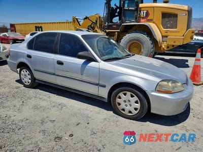 Czwarte zdjęcie samochodu z boku: 1998 HONDA CIVIC LX VIN:2HGEJ6672WH625645 - miniatura