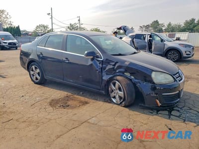 Czwarte zdjęcie samochodu z boku: 2009 VOLKSWAGEN JETTA SE VIN:3VWRZ71K69M150160 - miniatura