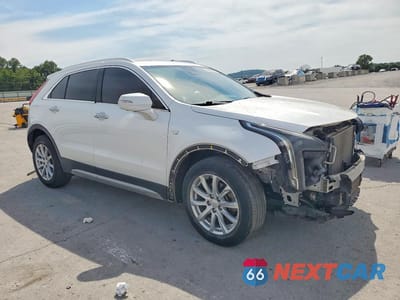 Czwarte zdjęcie samochodu z boku: 2019 CADILLAC XT4 PREMIUM LUXURY VIN:1GYFZDR48KF118059 - miniatura