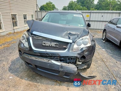 Piąte zdjęcie samochodu w środku: 2010 GMC ACADIA SL VIN:1GKLRKED3AJ224079 - miniatura