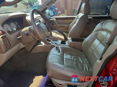 Zdjęcie 7 z 13 samochodu: 2002 JEEP GRAND CHEROKEE LIMITED VIN:1J4GW58N82C202381 - miniatura