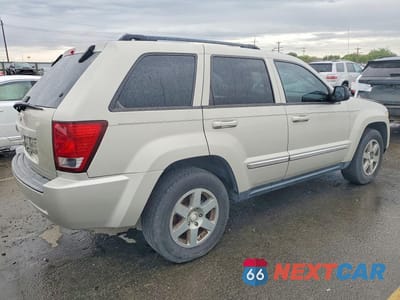 Trzecie zdjęcie samochodu z tyłu: 2010 JEEP GRAND CHEROKEE LAREDO VIN:1J4PR4GKXAC130753 - miniatura