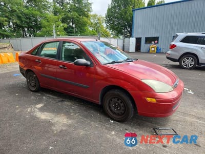 Czwarte zdjęcie samochodu z boku: 2003 FORD FOCUS LX VIN:1FAFP33Z83W302984 - miniatura