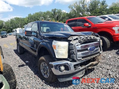 Czwarte zdjęcie samochodu z boku: 2015 FORD F350 SUPER DUTY VIN:1FT8W3BT1FEA33384 - miniatura