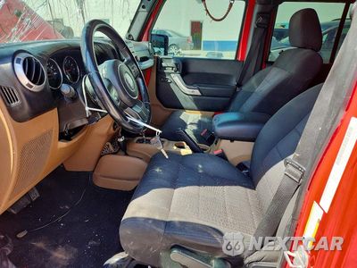 Zdjęcie 7 z 12 samochodu: 2011 JEEP WRANGLER UNLIMITED SAHARA VIN:1J4HA5H1XBL534497 - miniatura