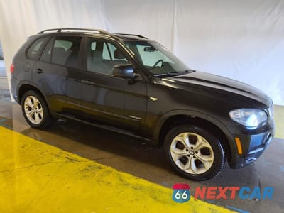 Czwarte zdjęcie samochodu z boku: 2012 BMW X5 XDRIVE50I VIN:5UXZV8C59CL425037 - miniatura