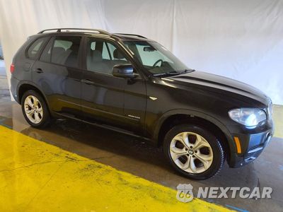 Czwarte zdjęcie samochodu z boku: 2012 BMW X5 XDRIVE50I VIN:5UXZV8C59CL425037 - miniatura