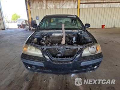 Piąte zdjęcie samochodu w środku: 2004 HYUNDAI ELANTRA GLS VIN:KMHDN46D84U916245 - miniatura
