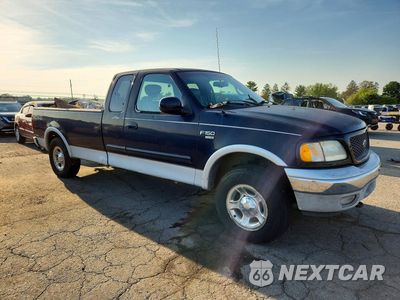 Czwarte zdjęcie samochodu z boku: 2001 FORD F-150 VIN:1FTRX18L11NB08865 - miniatura