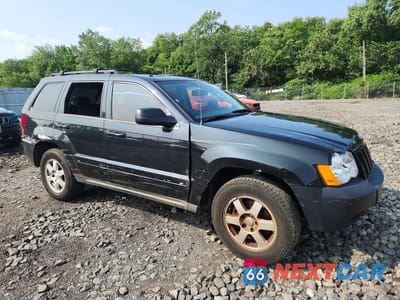 Czwarte zdjęcie samochodu z boku: 2009 JEEP GRAND CHEROKEE LAREDO VIN:1J8GR48K49C519722 - miniatura