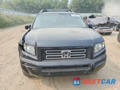 Piąte zdjęcie samochodu w środku: 2006 HONDA RIDGELINE RTL VIN:2HJYK16516H557747 - miniatura