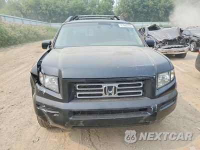 Piąte zdjęcie samochodu w środku: 2006 HONDA RIDGELINE RTL VIN:2HJYK16516H557747 - miniatura
