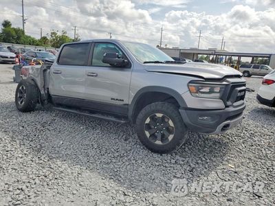 Czwarte zdjęcie samochodu z boku: 2020 RAM 1500 REBEL VIN:1C6RRELT9LN277275 - miniatura