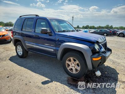 Czwarte zdjęcie samochodu z boku: 2002 JEEP LIBERTY SPORT VIN:1J4GL48K72W249778 - miniatura
