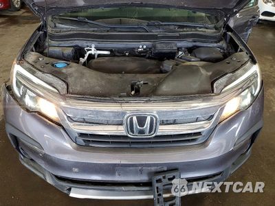 Zdjęcie 11 z 12 samochodu: 2021 HONDA PILOT EX VIN:5FNYF6H33MB060817 - miniatura