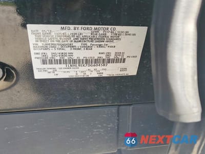 Zdjęcie 12 z 12 samochodu: 2013 LINCOLN MKS VIN:1LNHL9EK7DG604582 - miniatura