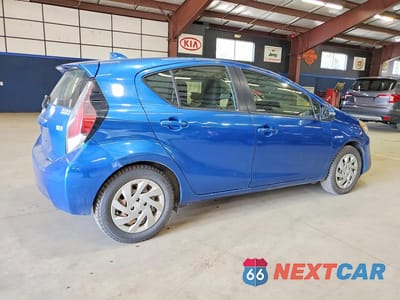 Trzecie zdjęcie samochodu z tyłu: 2015 TOYOTA PRIUS C ONE VIN:JTDKDTB34F1579860 - miniatura