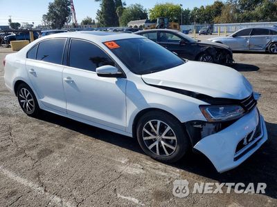 Czwarte zdjęcie samochodu z boku: 2017 VOLKSWAGEN JETTA SE VIN:3VWDB7AJXHM295741 - miniatura