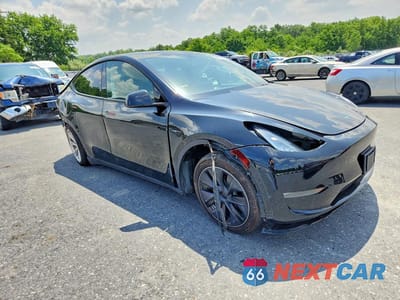 Czwarte zdjęcie samochodu z boku: 2022 TESLA MODEL Y VIN:7SAYGDEE5NA022272 - miniatura
