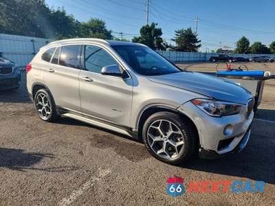 Czwarte zdjęcie samochodu z boku: 2018 BMW X1 XDRIVE28I VIN:WBXHT3C35J5K23482 - miniatura