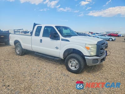Czwarte zdjęcie samochodu z boku: 2015 FORD F250 SUPER DUTY VIN:1FT7X2BT2FEA59530 - miniatura