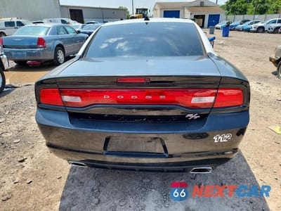 Zdjęcie 6 z 13 samochodu: 2012 DODGE CHARGER POLICE VIN:2C3CDXAT6CH150721 - miniatura
