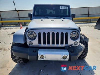Piąte zdjęcie samochodu w środku: 2015 JEEP WRANGLER UNLIMITED SAHARA VIN:1C4BJWEG0FL563913 - miniatura