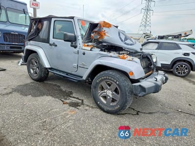 Czwarte zdjęcie samochodu z boku: 2015 JEEP WRANGLER SPORT VIN:1C4AJWAG4FL590002 - miniatura