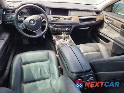 Zdjęcie 8 z 13 samochodu: 2015 BMW 740 I VIN:WBAYA6C5XFD827027 - miniatura