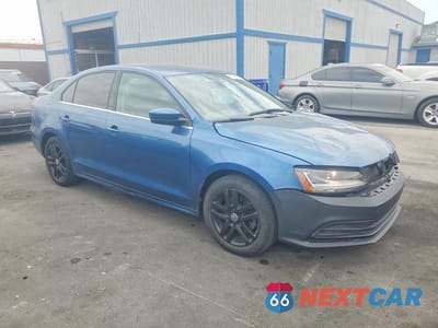Czwarte zdjęcie samochodu z boku: 2017 VOLKSWAGEN JETTA S VIN:3VW2B7AJ7HM306945 - miniatura