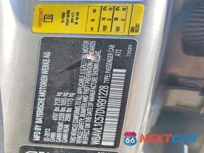 Zdjęcie 12 z 12 samochodu: 2013 BMW X1 XDRIVE28I VIN:WBAVL1C57DVR91228 - miniatura