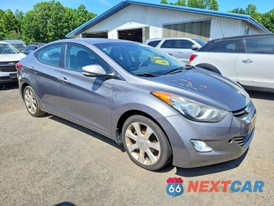 Czwarte zdjęcie samochodu z boku: 2011 HYUNDAI ELANTRA LIMITED VIN:5NPDH4AE1BH076411 - miniatura