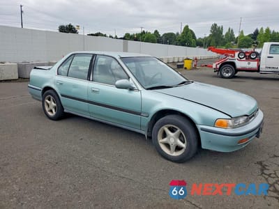 Czwarte zdjęcie samochodu z boku: 1992 HONDA ACCORD LX VIN:1HGCB7555NA121789 - miniatura