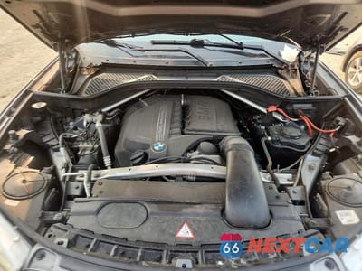 Zdjęcie 12 z 13 samochodu: 2014 BMW X5 SDRIVE35I VIN:5UXKR2C54E0C01488 - miniatura
