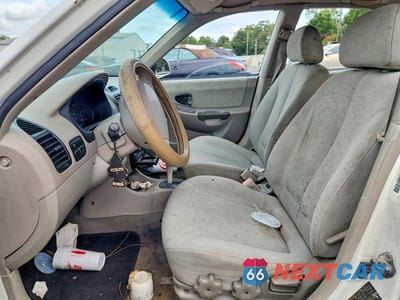 Zdjęcie 7 z 12 samochodu: 2003 HYUNDAI ACCENT GL VIN:KMHCG45C93U466618 - miniatura