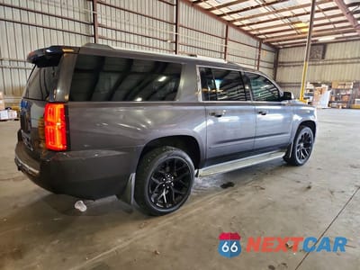 Trzecie zdjęcie samochodu z tyłu: 2015 CHEVROLET SUBURBAN K1500 LTZ VIN:1GNSKKKC7FR142055 - miniatura