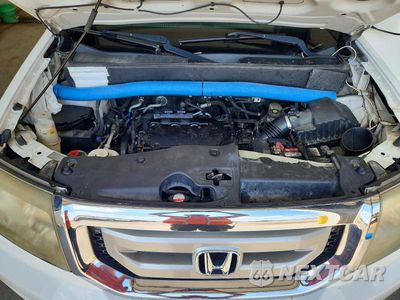 Zdjęcie 12 z 14 samochodu: 2009 HONDA PILOT EXL VIN:5FNYF48639B039357 - miniatura