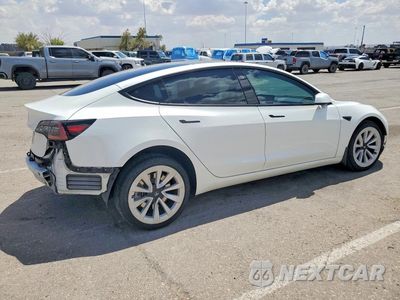 Trzecie zdjęcie samochodu z tyłu: 2023 TESLA MODEL 3 VIN:5YJ3E1EA6PF473550 - miniatura
