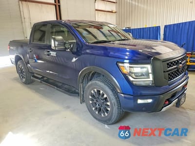 Czwarte zdjęcie samochodu z boku: 2022 NISSAN TITAN PRO-4X VIN:1N6AA1ED9NN105260 - miniatura
