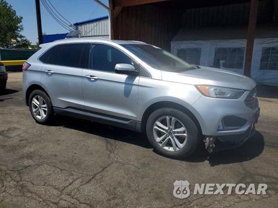 Czwarte zdjęcie samochodu z boku: 2019 FORD EDGE SEL VIN:2FMPK4J99KBC75277 - miniatura