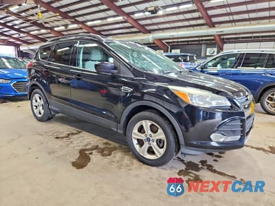 Czwarte zdjęcie samochodu z boku: 2016 FORD ESCAPE SE VIN:1FMCU9GX5GUA41568 - miniatura