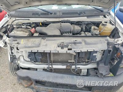 Zdjęcie 12 z 13 samochodu: 2014 FORD ECONOLINE E150 VAN VIN:1FTNS1EW2EDA76628 - miniatura