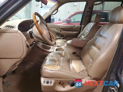 Zdjęcie 7 z 14 samochodu: 1998 LINCOLN NAVIGATOR VIN:5LMFU28L1WLJ03811 - miniatura