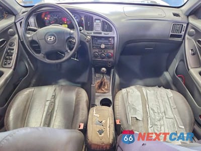 Zdjęcie 8 z 12 samochodu: 2004 HYUNDAI ELANTRA GT VIN:KMHDN56D34U127183 - miniatura